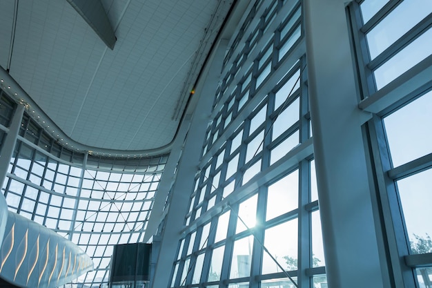 Beautiful modern design hall with windows at the airport in Abu Dhabi Travel and check in