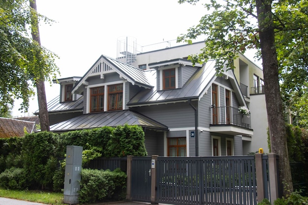 Beautiful modern house in Jurmala Latvia The house is immersed in greenery Traditional Jurmala architecture