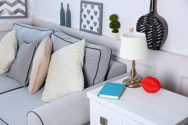 Beautiful modern living room with grey sofa