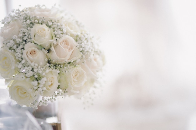 Photo beautiful modern wedding bouquet on white table.soft focus