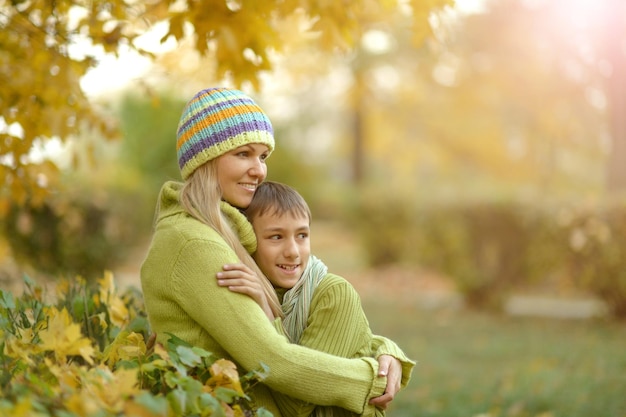 Beautiful mother with son in park