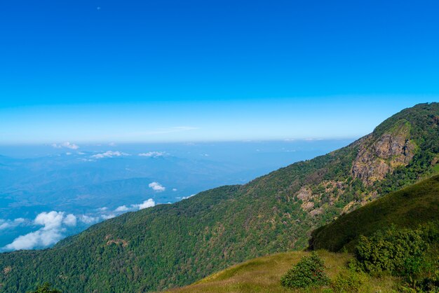 beautiful mountain layer with clouds and blue sky at  Kew Mae Pan Nature Trail in Chiang Mai, Thailand