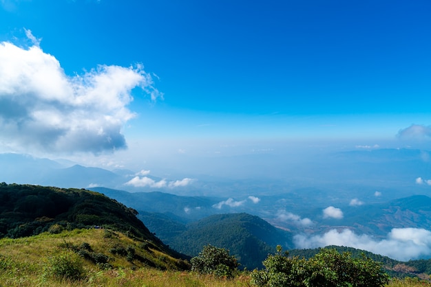 beautiful mountain layer with clouds and blue sky at  Kew Mae Pan Nature Trail in Chiang Mai, Thailand