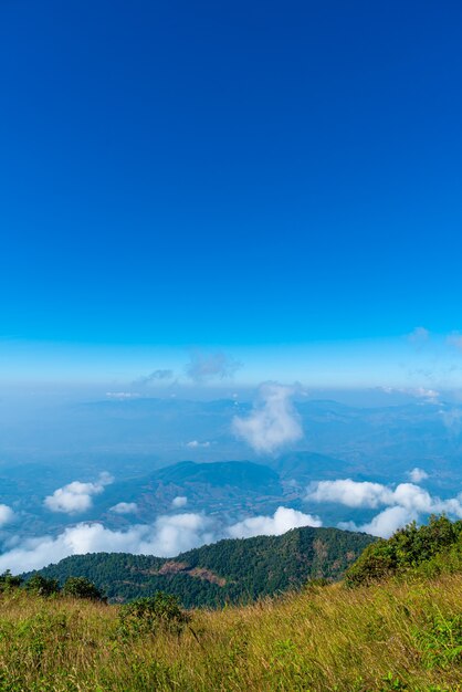 beautiful mountain layer with clouds and blue sky at  Kew Mae Pan Nature Trail in Chiang Mai, Thailand