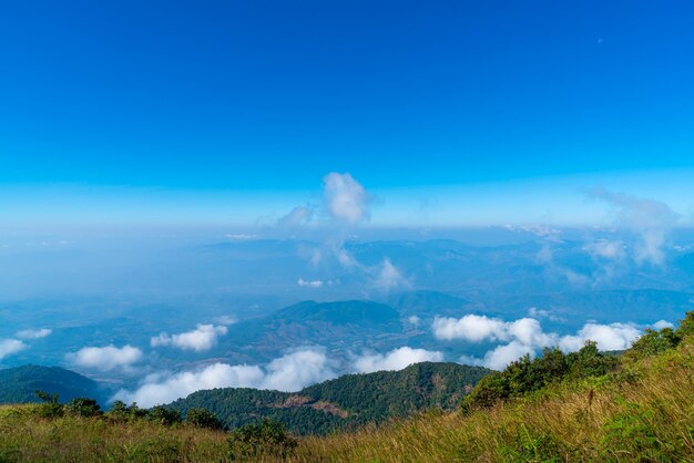 beautiful mountain layer with clouds and blue sky at  Kew Mae Pan Nature Trail in Chiang Mai, Thailand