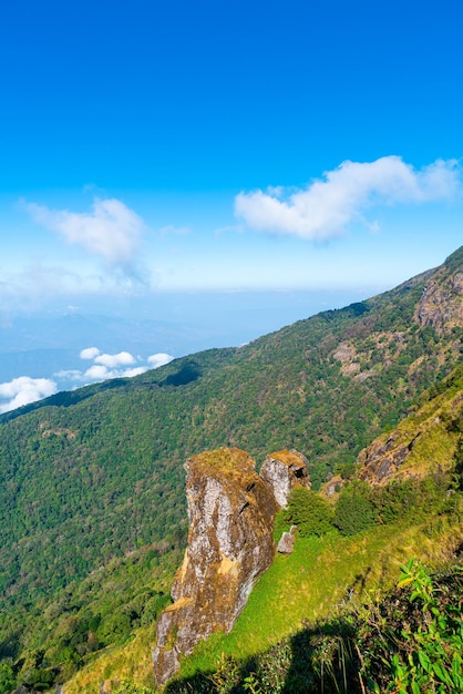 beautiful mountain layer with clouds and blue sky at  Kew Mae Pan Nature Trail in Chiang Mai, Thailand