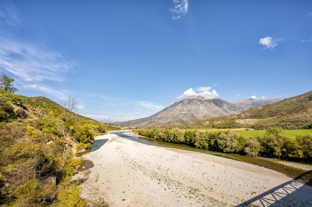 Beautiful mountain valley with gentle hills and river