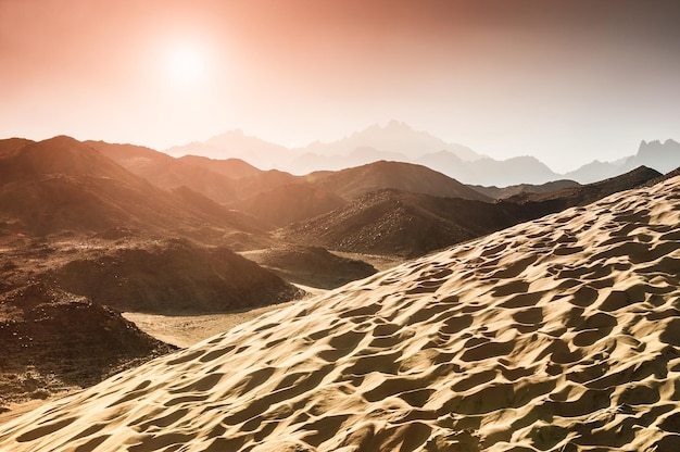 Beautiful mountains in the Arabian desert at sunset. Summer landscape. Vintage effect