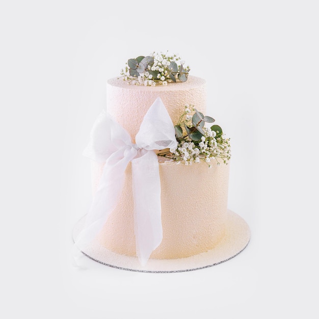 Beautiful multitiered wedding cake with flowers