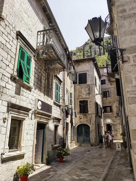Beautiful narrow street with lantern in old town of Kotor Montenegro