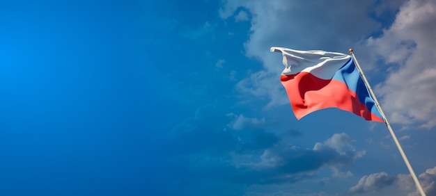 Beautiful national state flag of Czech on blue sky