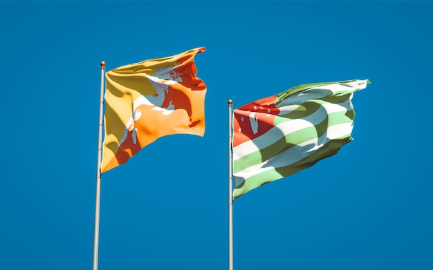 Красивые национальные государственные флаги Абхазии и Бутана вместе