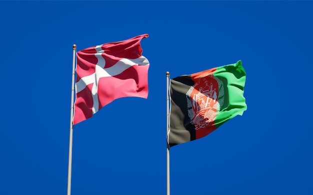 Beautiful national state flags of Afghanistan and Denmark