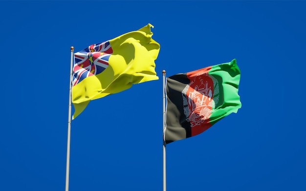 Beautiful national state flags of Afghanistan and Niue