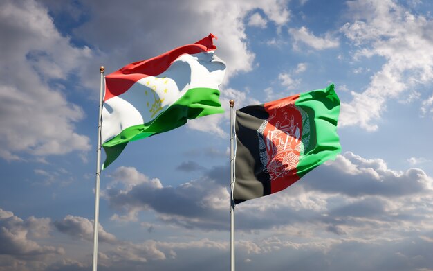 Beautiful national state flags of Afghanistan and Tajikistan