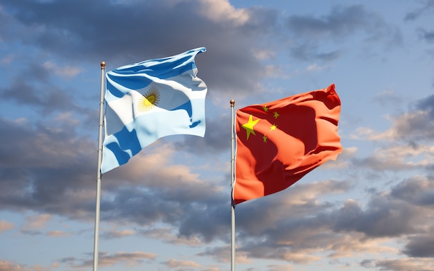 Beautiful national state flags of China and Argentina together at the sky 