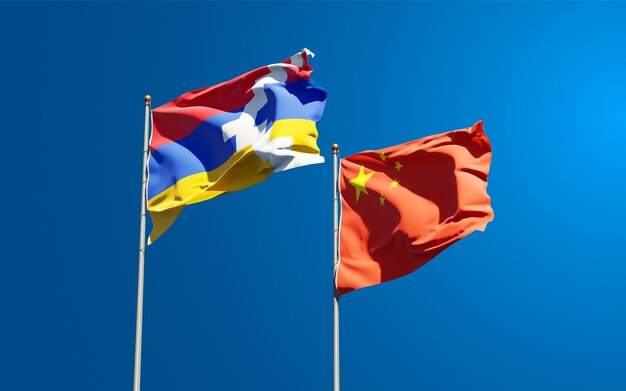 Beautiful national state flags of China and Artsakh together at the sky 