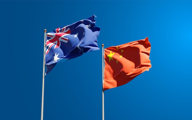 Beautiful national state flags of China and Australia together at the sky 