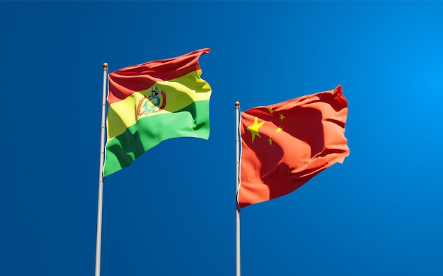 Beautiful national state flags of china and bolivia together at the sky