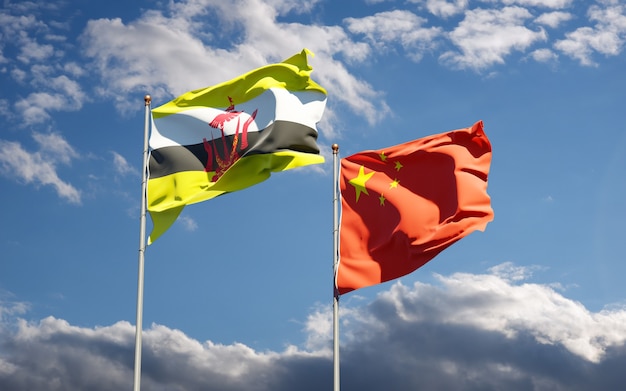 Beautiful national state flags of China and Brunnei together at the sky 