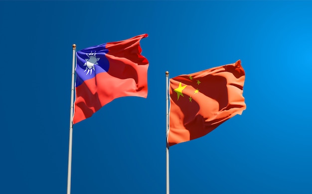 Beautiful national state flags of China and Taiwan together at the sky 