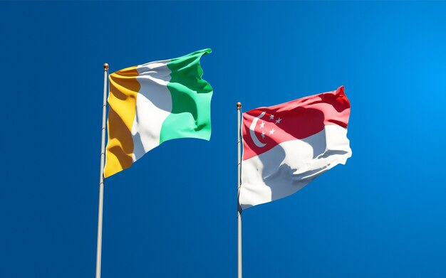 Beautiful national state flags of Cote d'Ivoire and Singapore together