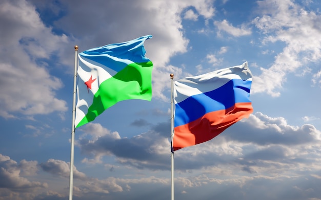 Beautiful national state flags of Djibouti and Russia together on blue sky. 3D artwork