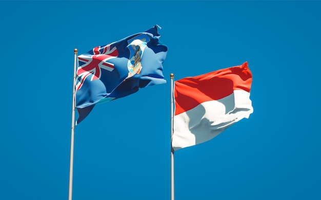 Beautiful national state flags of Falkland Islands and Indonesia together on blue sky