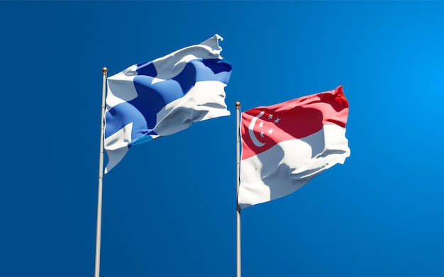 Красивые национальные государственные флаги Финляндии и Сингапура вместе