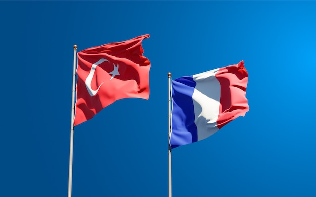 Beautiful national state flags of France and Turkey together at the sky 