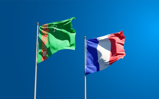 Beautiful national state flags of france and turkmenistan together at the sky