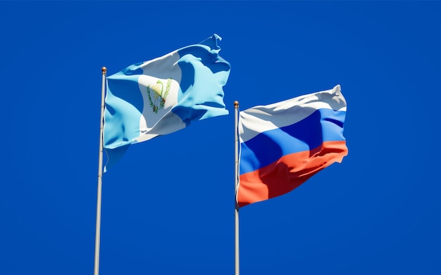 Beautiful national state flags of Guatemala and Russia together on blue sky. 3D artwork