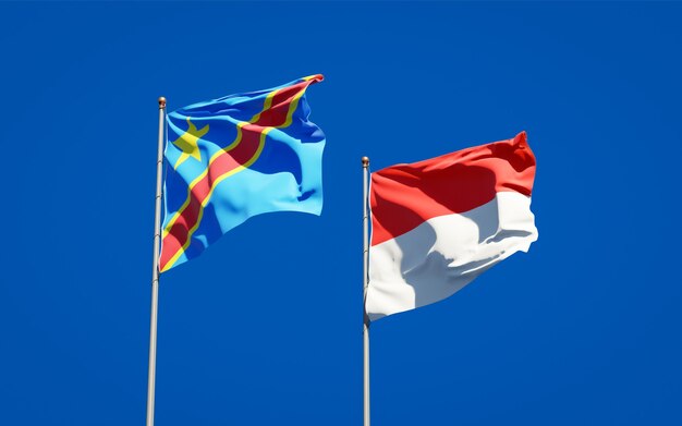 Beautiful national state flags of Indonesia and Congo together on blue sky