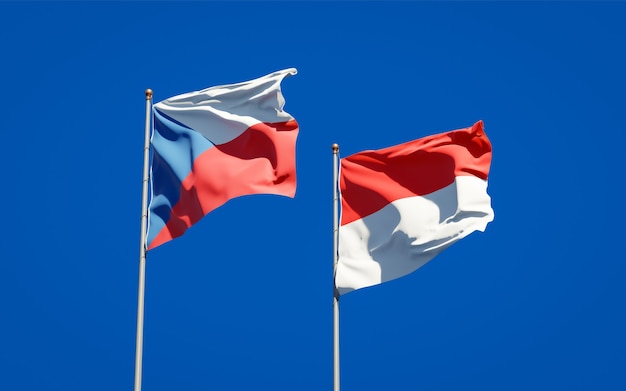 Beautiful national state flags of Indonesia and Czech together on blue sky