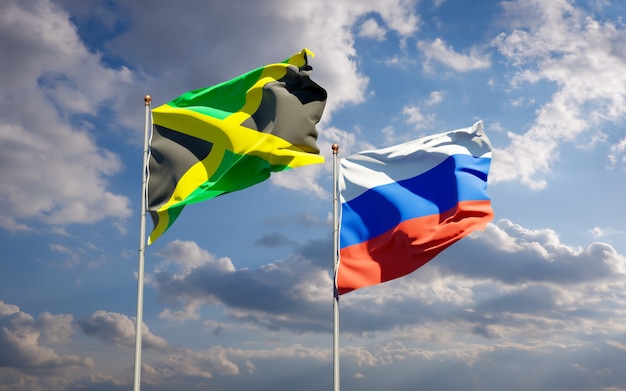 Beautiful national state flags of Jamaica and Russia together on blue sky. 3D artwork