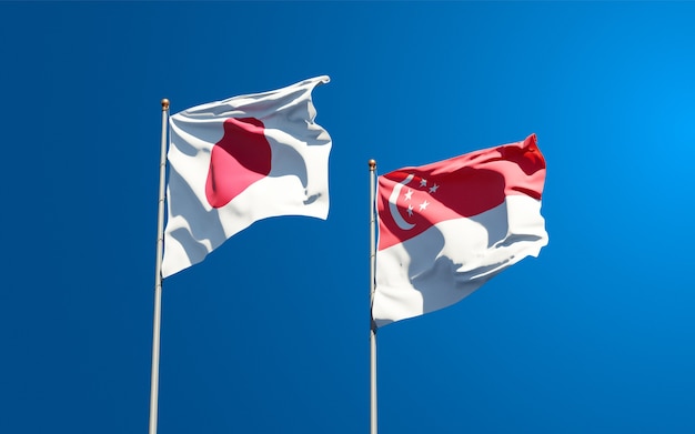 Beautiful national state flags of Japan and Singapore together