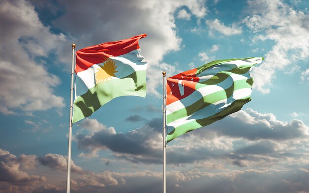 Beautiful national state flags of Kurdistan and Abkhazia together