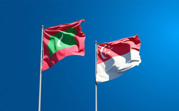 Beautiful national state flags of Maldives and Singapore together