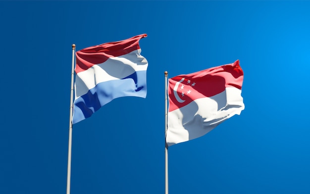 Beautiful national state flags of Netherlands and Singapore together