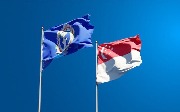 Beautiful national state flags of Northern Mariana Islands and Singapore together