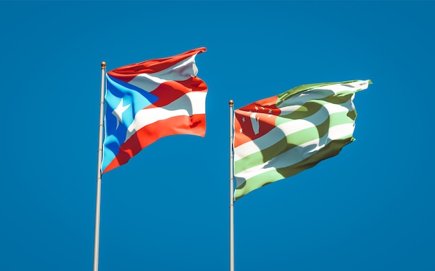 Beautiful national state flags of Puerto Rico and Abkhazia together