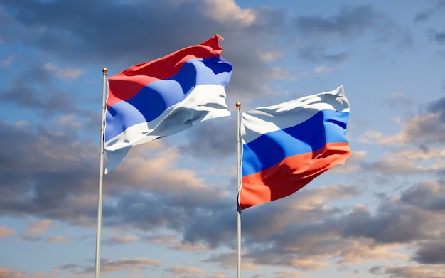 Beautiful national state flags of republika srpska and russia together on blue sky. 3d artwork