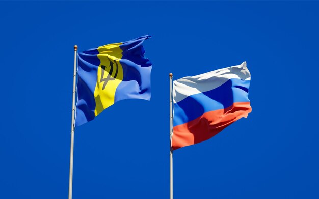 Beautiful national state flags of Russia and Barbados together on blue sky. 3D artwork