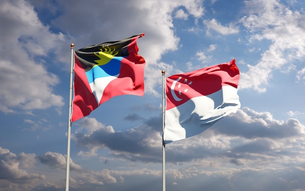 Beautiful national state flags of Singapore and Antigua and Barbuda