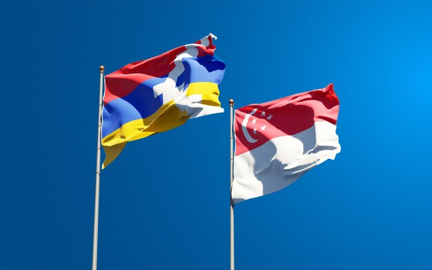 Beautiful national state flags of Singapore and Artsakh