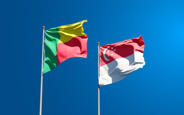 Beautiful national state flags of Singapore and Benin