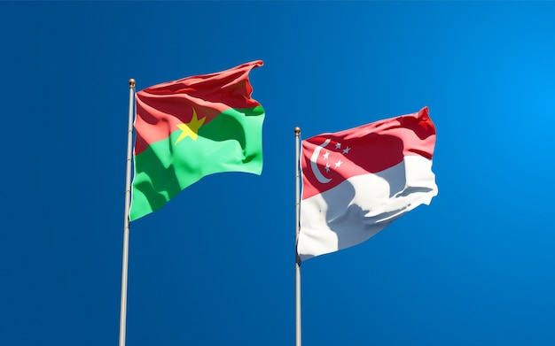 Beautiful national state flags of Singapore and Burkina Faso