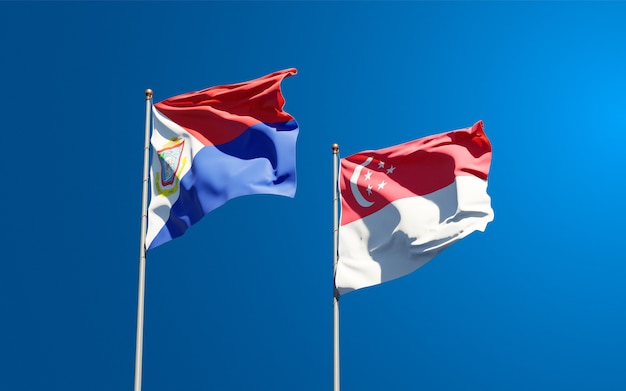 Beautiful national state flags of Sint Maarten and Singapore together