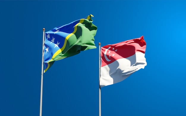 Beautiful national state flags of Solomon Islands and Singapore together