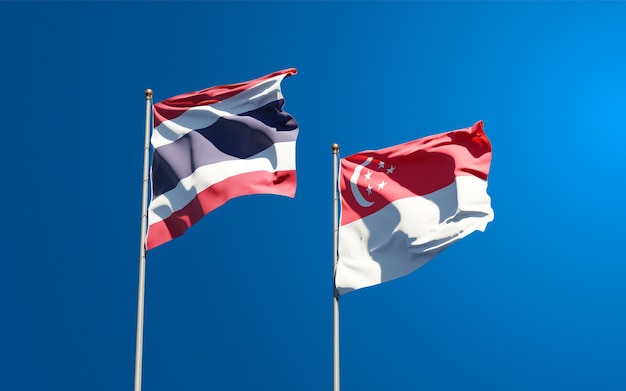 Beautiful national state flags of Thailand and Singapore together